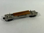 Lionel 3361-55 Operating Dump Flatcar, 4 Logs, Non-operational, Bin 15. Fixed Price $10.95.