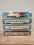 Nice Lot Of 4 Atlas Santa Fe Locomotive & Illuminated Passenger Cars Boxes. Fixed Price $99.99.